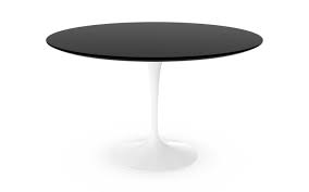 Be sure to look through all of the modern chairs to suit your new table and provide plenty of seating for your guests. Knoll International Saarinen Round Dining Table 120 Cm White Laminate Black By Eero Saarinen 1955 1957 Designer Furniture By Smow Com