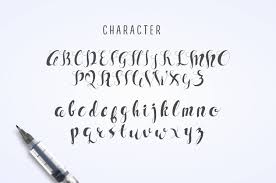 Hand lettering alphabet cursive letters doodle lettering creative lettering calligraphy letters. Sam Hand Lettering Calligraphy Font In Fonts On Yellow Images Creative Store