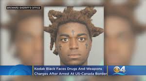 Kodak black hairstyle name one of simple hairstyles for men there are plenty of simple mens hairstyles style for you ideas to explore this kodak black hairstyle name idea you can browse by hairstyle and. South Florida Rapper Kodak Black Faces Drug Weapons Charges At Us Canada Border Youtube