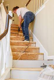 Once it dries, apply two coats of clear coat. Diy Hardwood Staircase Makeover Replacing Carpet With Wood Treads On Pie Steps And Curved Landings T Moore Home Interior Design Studio