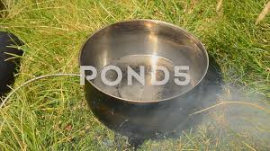 It is water that, in taking different forms, constitutes the earth, atmosphere, sky, mountains, gods and men, beasts and birds, grass and trees, and animals. Water Boiling In A Saucepan On Fire Outdoors Stock Footage Ad Saucepan Boiling Water Fire Water Boiling Water Outdoor