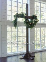 Ceremony Decor With Cross And Beautiful Greenery In 2020 Ceremony Decorations Decor Ladder Decor