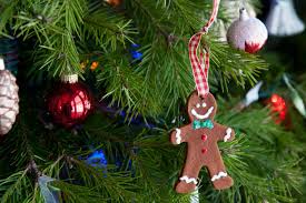 Behind all the santas there's a display of cute gingerbread houses and pretty snow globes. Gingerbread Man Themed Classroom Christmas Party Not So Wimpy Teacher