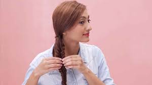 Pull hair back into a ponytail. How To Fishtail Braid Your Hair Easy Braid Tutorial For Beginners
