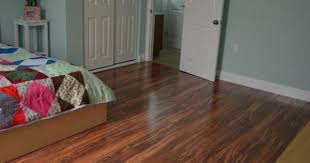 Pergo Xp Hawaiian Curly Koa 10 Mm T X 4 87 In W X 47 87 In L Laminate Flooring 13 1 Sq Ft Case Lf000340 The Home Depot Flooring Laminate Flooring Pergo