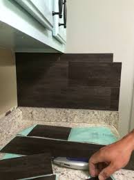 Our 40 Backsplash Using Vinyl Flooring Re Fabbed Vinyl Flooring Home Remodeling Flooring