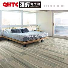 A wooden bedroom is an epitome of an earthy interior decor, and it's no less earthy when the design is modern. China High Quality Wooden Look Porcelain Glazed Polished Tile Bedroom Flooring Tiles 600x1200mm 200x1200mm China Building Material Porcelain Tiles