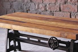 This is from the woodbriar collection. Hyatt Fulton Industrial Adjustable Height Coffee Dining Table Little Tree