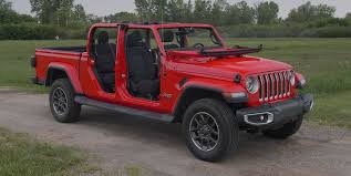 Another setup i came across at the same event was the fiftyten camper system which is german manufactured and imported here to the u.s. How To Remove The 2020 Jeep Gladiator S Doors Roof And Windshield