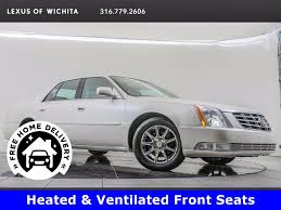 Remove seat by pulling up the front of the seat till it unlatches. Pre Owned 2011 Cadillac Dts Luxury 4dr Car In Burnsville 54ad544t Walser Automotive Group