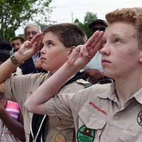 Jacob Hammon, left, and Hayden Gantt, salute the American