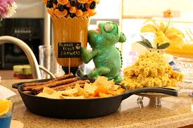 On the menu we had this was the food table that was filled with goodies! Tangled Party Ideas For My Rapunzel S 5th Birthday Raising Whasians
