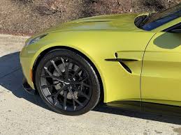 Image result for Helios Yellow 2025 Aston Martin