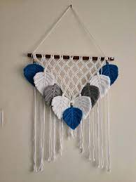 Macrame fish wall hanging unfettered co specializes in handmade modern fibre art and bohemian macrame statement pieces designed to fill your home with interior crafts macrame wall hanging diy modern materials macrame projects room diy macrame diy macrame room divider. Macrame Feather Wall Hanging Boho Chic Style Home Decor Bohemian Wall Decor Bedroom Backdrop Christmas Decorations In 2021 Macrame Feather Wall Hanging Feather Wall Hanging Macrame Design