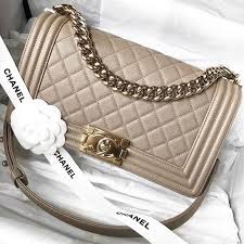 Authentic Black And White Chanel Bag Beauty Authentic Chanel Dark Beige 17p Caviar Old Medium Boy With Shiny Light Gold Hardware 4350 At Opulent Habits Come Chanel Handbags Chanel Bag Bags