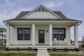 Modest footprints make bungalow house plans and the related prairie and craftsman styles ideal for small or narrow lots. Lovely Mackinaw Porch Whiteporch Cutecottage Lakehouse Smallhome Quaint Newhome Eastbrookhomes Simple House Plans American Houses Bungalow House Design