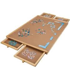 Jigsaw puzzle tables are perfect for senior living centers! Jigsaw Puzzle Coffee Table Wayfair