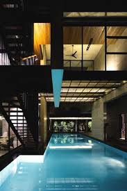Love Pools That Flow Under House Great Use Of Space Indoor Pool Design House Design Architecture House