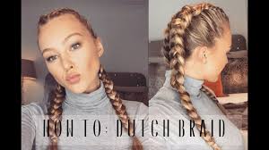 Part your hair in the center. How To Dutch Braid Your Own Hair Hollie Hobin Youtube