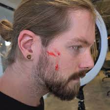 Evan Chandler Tattoo