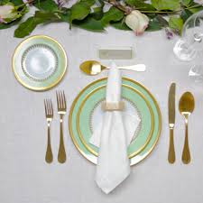 The napkin is placed to the left of the setting with the fork, knife (blade facing the fork) and spoon placed in that order on top of. How To Set A Table A Guide To Table Setting Architectural Digest