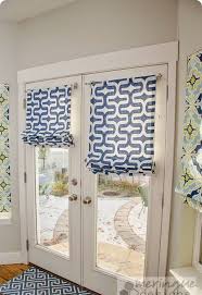 To add a little flair to plain white fabric, a ribbon of blue trim runs a vertical path down each side, tying the window treatment with the chair upholstery. 3 Ways And 23 Ideas To Cover French Door Windows Shelterness