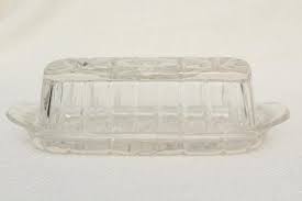 This lidded butter dish is made of glass. Anchor Hocking Glass Butter Dish With Cover Butter Dishes
