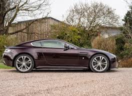 Image result for Magma Red 2012 Aston Martin