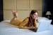 Woman Sitting On Couch