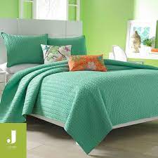 Blankets are two layers and hand tied for increased strength and durability. Camdyn Bright Solid Color Quilted Coverlet From J By J Queen New York