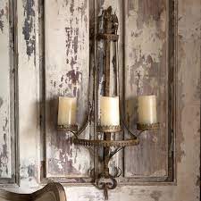 What are the shipping options for farmhouse candle holders? Filigree Wall Sconce Candle Holder Antique Farmhouse
