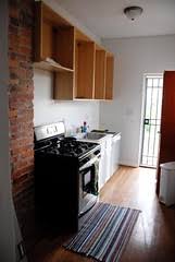 staggered height wall cabinets take