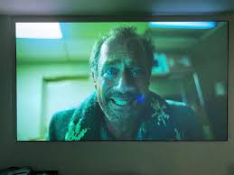 Integrating a center speaker with a projector setup