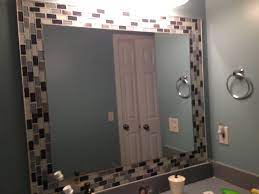 I had an old mirror that i never used because it had some. Glass Tiles Around Mirror Jazzes Up Any Bathroom So Easy Bathroom Mirror Design Tile Around Mirror Diy Vanity Mirror