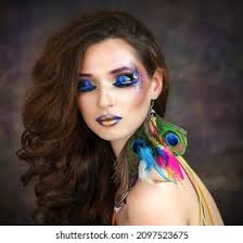Girl Peacock Feather Stock Photos and Pictures