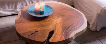 Store blankets or extra throw pillows in the trunk, then use the coffee table for its intended purpose. Tree Trunk Coffee Tables Unik Living Unique Coffee Tables