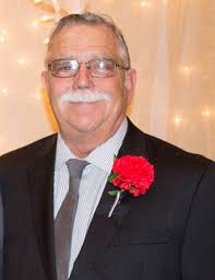 Obituary information for James M. "Mike" Huesman