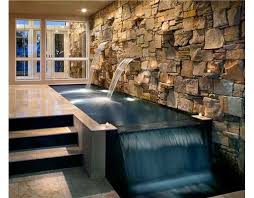 a unique exterior water feature highlights the foyer entrance to this contemporary custom home 1 750 000 00 indian rocks beach water features entrance design
