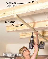 Another great diy garage storage idea that will certainly help you save a lot of space and trouble is this one: Create A Sliding Overhead Storage System Garage Gym Organization