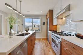Arizona Cypress Kitchen With Gloss White Wall Cabinets Crystal Cabinets Contemporary Kitchen Design Kitchen Design White Gloss Kitchen