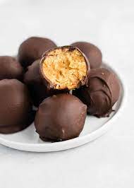 Beat the confectioners' sugar, peanut butter, melted butter, vanilla extract and salt with an electric mixer until well combined. No Bake Peanut Butter Truffles Recipe Build Your Bite