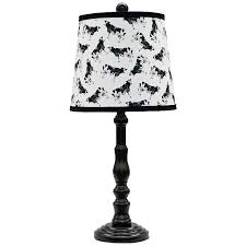 Way up high atop a tall dresser where height might not be desirable or anywhere where a little touch is just enough. Townsend Black Accent Table Lamp With Black Cows Shade 72x55 Lamps Plus