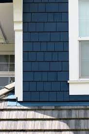 Bold and electrically blue for your cape cod, colonial, or other classic homes. The Almost Nicest Navy House Warline Painting Exterior Paint Colors For House House Exterior Blue Exterior House Colors