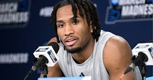 Darryn Peterson talks in locker room after NCAA Tournament win