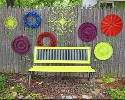 Overseeding is the process of adding new grass seed to your existing lawn and the transformation can done quickly and easily with simple lawn renovation. Creative Composting How To Recycle In Your Yard Recycled Garden Art Fence Decor Diy Garden Fence