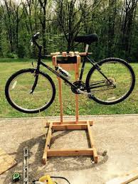 I've been using my ceiling mounted bike lift to hold my bike when doing minor repairs or adjustments. Homemade Wooden Bicycle Stand With Dual Mounting 5 Steps With Pictures Instructables