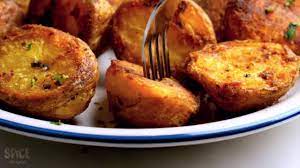 Make Perfectly Roasted Potatoes At Home With Or Without Oven Roasted Potato Recipes Roasted Potatoes Potatoes