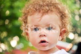 Burgundy (dark red, red wine color) is actively used for hair dyeing in brunettes. Cute Curly Red Haired Boy Stock Photos Freeimages Com