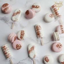 Who Says Hen Do Treats Can T Be Classy Rose Gold Sparkle Macarons And Cake Popsicles Macarons Rose Gold Wedding Cakes Rose Gold Wedding Favors Gold Dessert