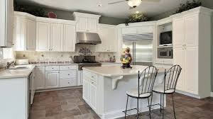 white kitchen cabinets with granite